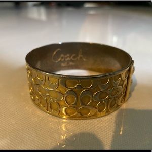 Massive gold coach bangle